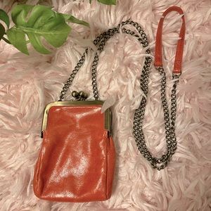 Rare orange HOBO International double coin purse crossbody.